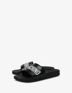 Moschino Sandals & Mules^PVC pool slides with logo